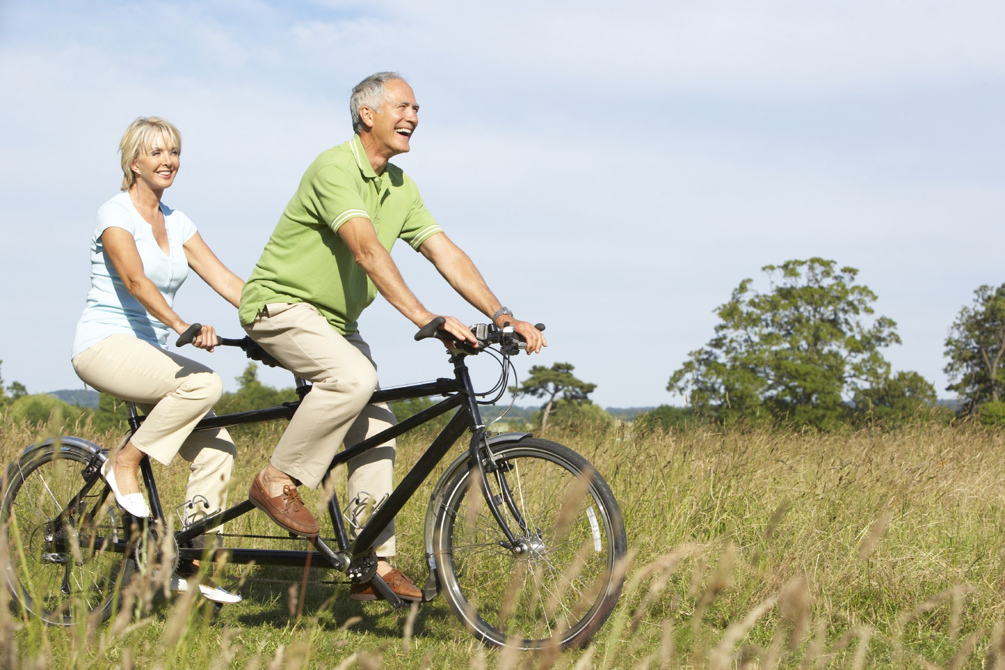 Senior Couple Riding Tandem Bike